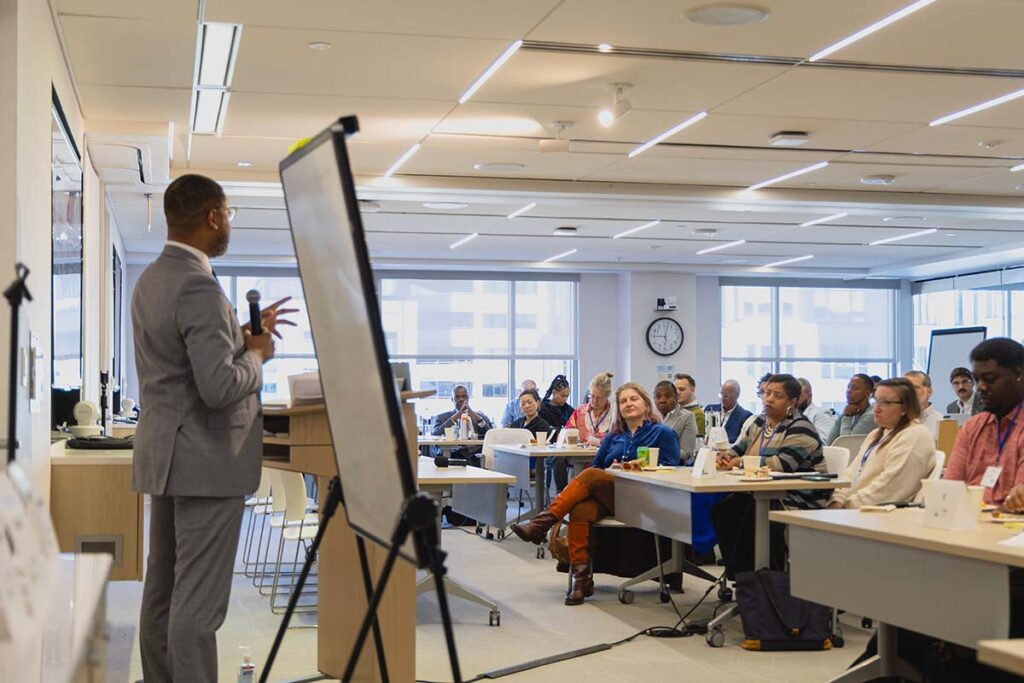 corporate event photo of a man in front of a conference